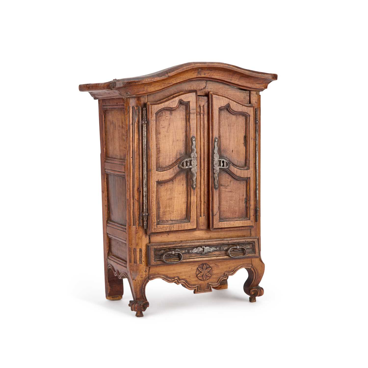 Lot 1353 - AN ANTIQUE CARVED MINIATURE ARMOIRE