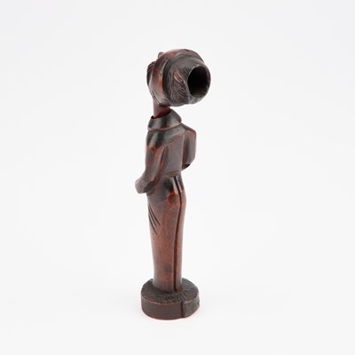 Lot 1346 - A 19TH CENTURY FIGURAL TREEN PIPE HOLDER