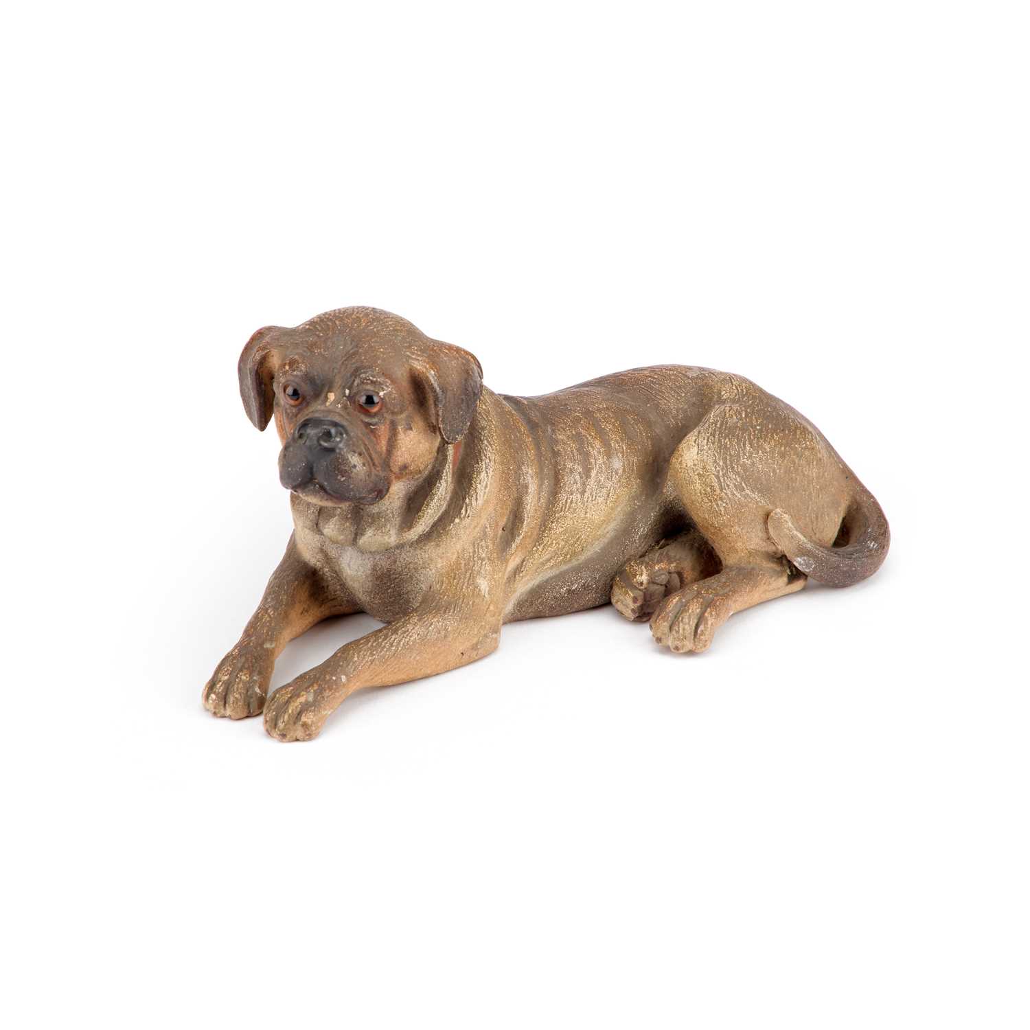 Lot 826 - AN AUSTRIAN PAINTED TERRACOTTA MODEL OF A RECUMBENT DOG