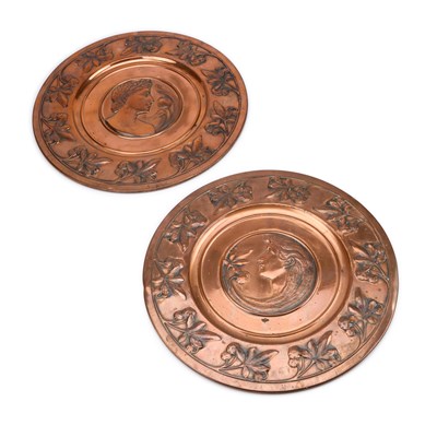 Lot 220 - A LARGE PAIR OF ARTS AND CRAFTS COPPER CHARGERS