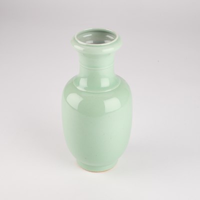 Lot 162 - A CHINESE SLIP-DECORATED CELADON VASE