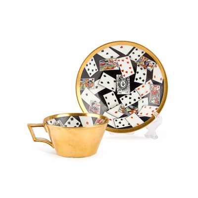 Lot 32 - A RARE DERBY TROMPE L'OEIL 'PLAYING CARDS' CUP AND SAUCER, CIRCA 1815