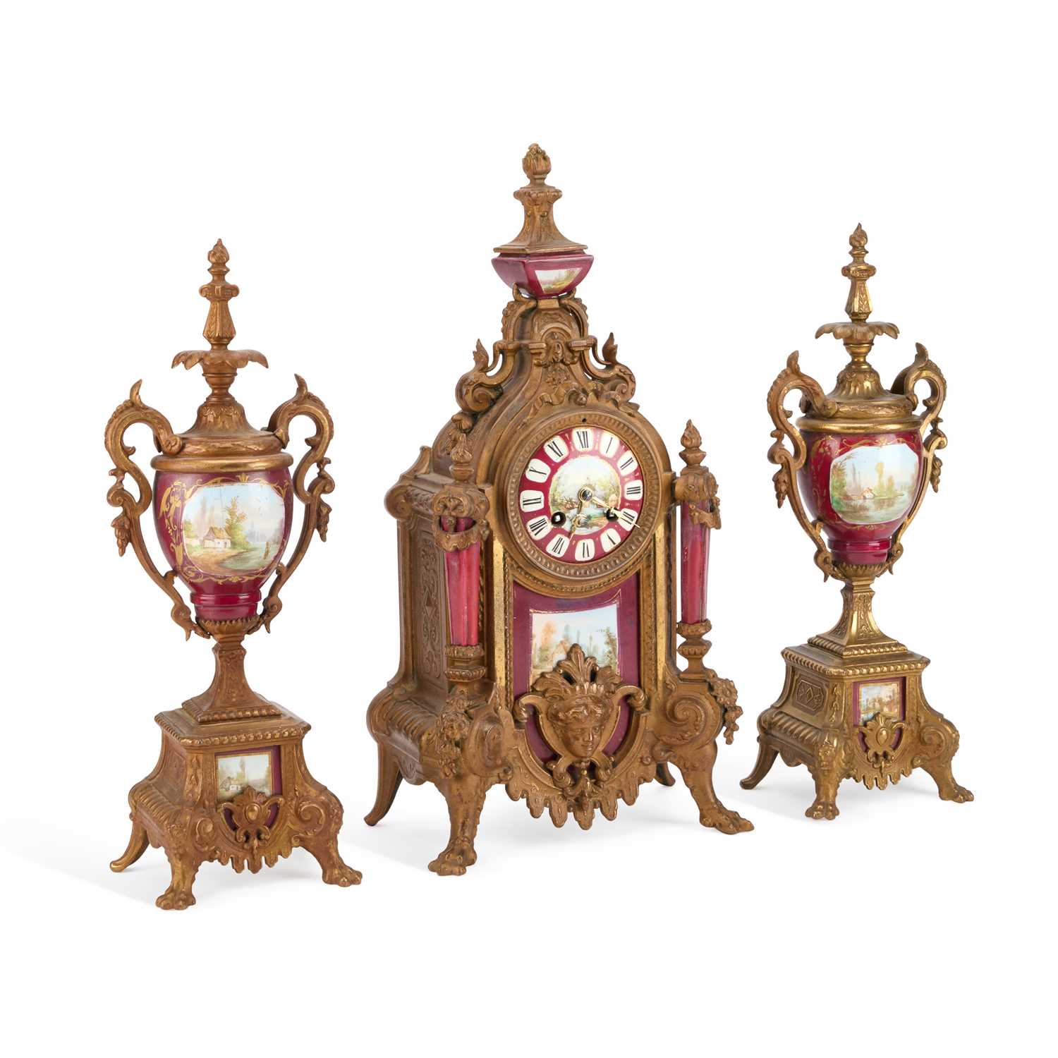 Lot A LATE 19TH CENTURY FRENCH GILT-METAL AND MAGENTA-GROUND PORCELAIN CLOCK GARNITURE