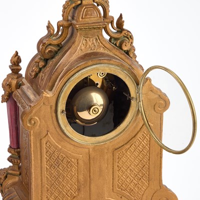 Lot A LATE 19TH CENTURY FRENCH GILT-METAL AND MAGENTA-GROUND PORCELAIN CLOCK GARNITURE