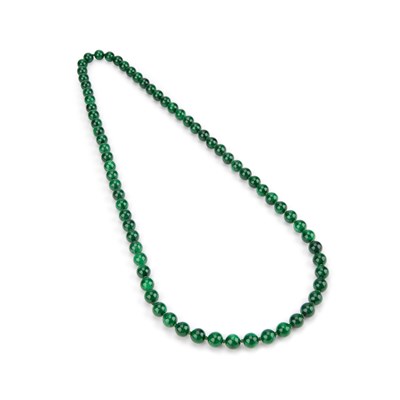 Lot 151 - A STRING OF JADEITE BEADS