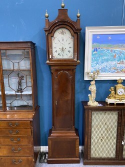 Lot A GEORGE III MAHOGANY EIGHT-DAY LONGCASE CLOCK