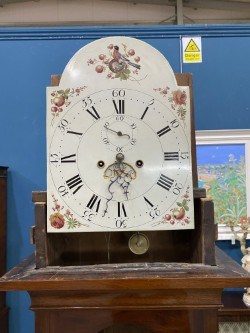 Lot A GEORGE III MAHOGANY EIGHT-DAY LONGCASE CLOCK