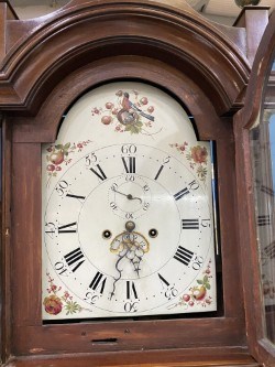 Lot A GEORGE III MAHOGANY EIGHT-DAY LONGCASE CLOCK