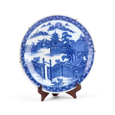 Lot 213 - A JAPANESE BLUE AND WHITE CHARGER