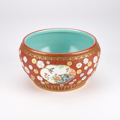 Lot A CHINESE FAMILLE ROSE ENAMELLED CORAL-RED GROUND JARDINIÈRE