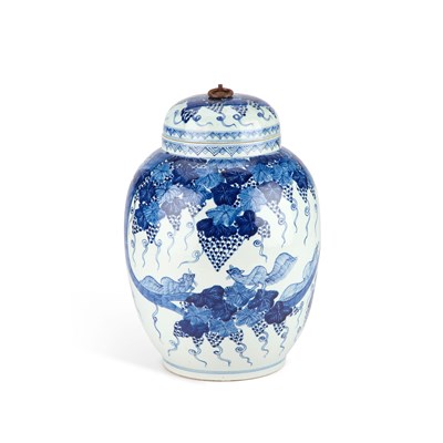 Lot 92 - A CHINESE BLUE AND WHITE 'SQUIRREL AND GRAPE' JAR AND COVER