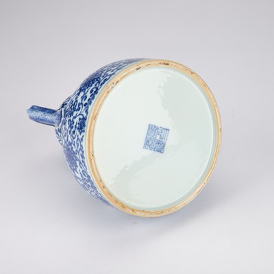 Lot A CHINESE BLUE AND WHITE DOUBLE-GOURD AND 'RUYI' HANDLED LOTUS FLASK