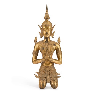 Lot 163 - A THAI GILT-METAL FIGURE OF A KNEELING THEPPHANOM