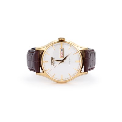 Lot 552 - A GENTS GOLD PLATED TISSOT AUTOMATIC STRAP WATCH