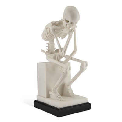 Lot 1072 - A 20TH CENTURY SCHOOL COMPOSITE SCULPTURE OF A SEATED SKELETON