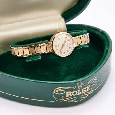 Lot 668 - A LADY'S 9CT GOLD ROLEX BRACELET WATCH