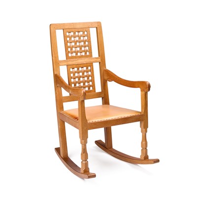 Lot 1360 - ROBERT THOMPSON OF KILBURN, A MOUSEMAN OAK ROCKING CHAIR