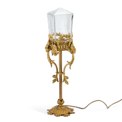 Lot 117 - A GILT-METAL AND CUT-GLASS TABLE LAMP