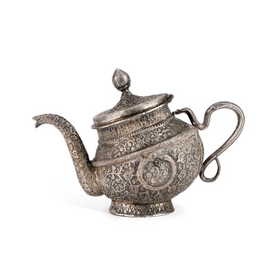 Lot 334 - AN INDAN KASHMIRI SILVER TEAPOT