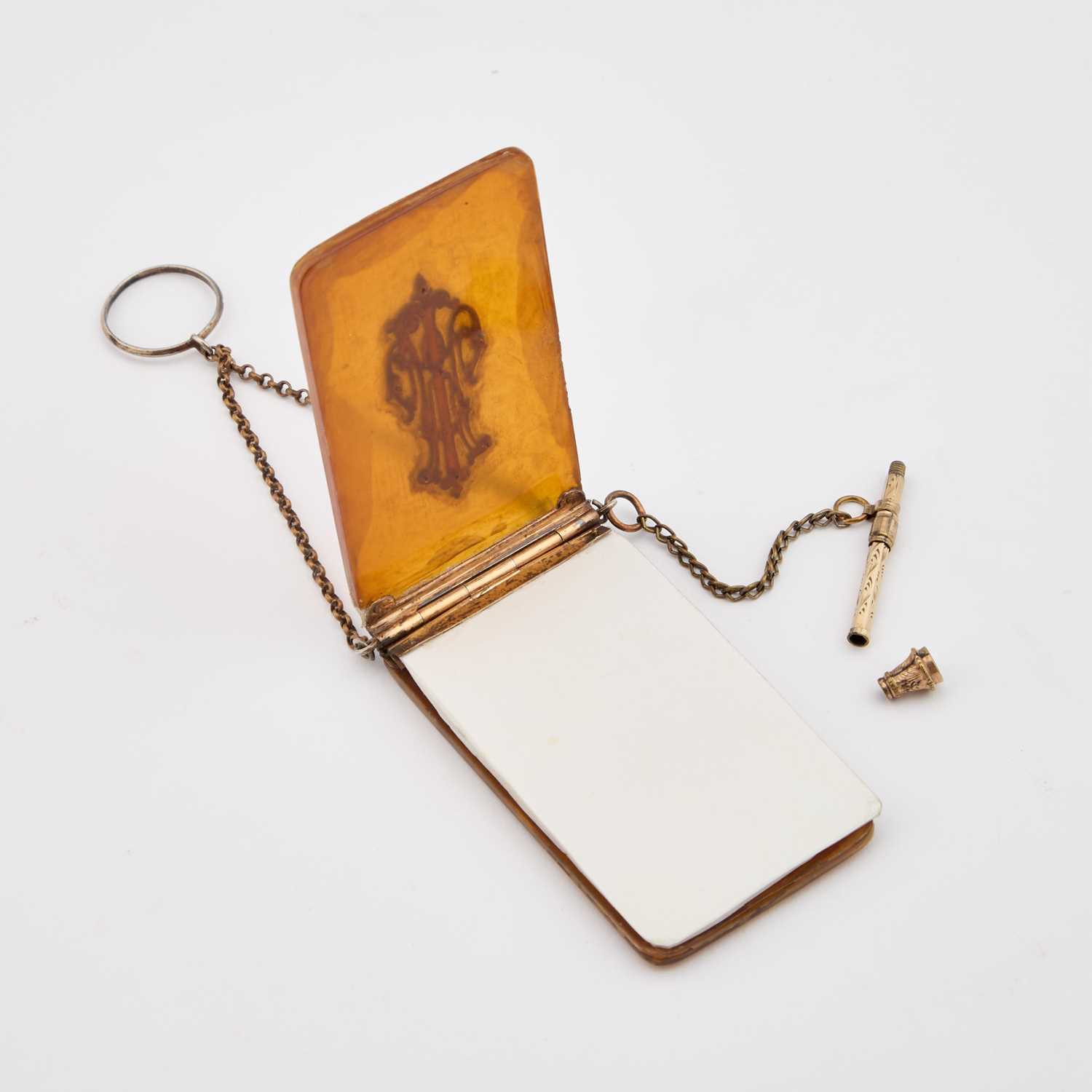 Lot 562 - A LATE 19TH CENTURY NOTEBOOK AND PROPELLING