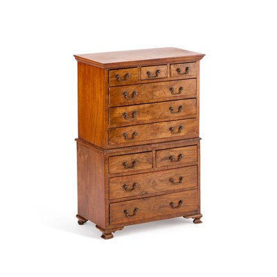 Lot 110 - A GEORGIAN STYLE WALNUT MINIATURE CHEST ON CHEST