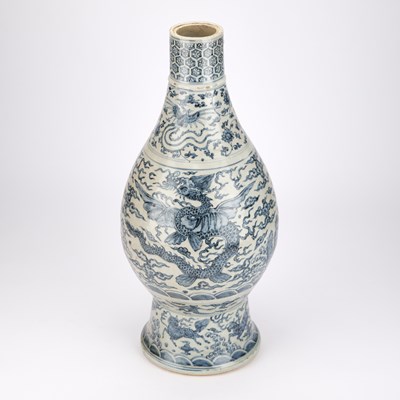 Lot A LARGE CHINESE YUAN-STYLE BLUE AND WHITE PEAR-SHAPED 'DRAGON' VASE