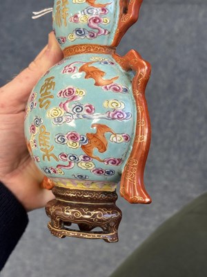 Lot A CHINESE TURQUOISE-GROUND FAMILLE ROSE WALL VASE