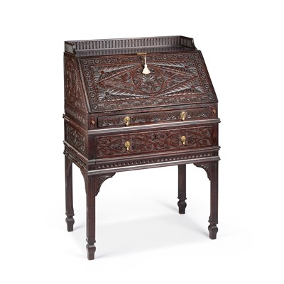 Lot 1271 - A 19TH CENTURY CARVED OAK BUREAU ON STAND