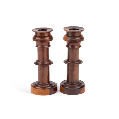 Lot 125 - A PAIR OF 19TH CENTURY LIGNUM VITAE CANDLESTICKS