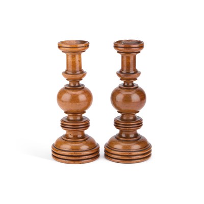 Lot 126 - A PAIR OF 19TH CENTURY TREEN CANDLESTICKS