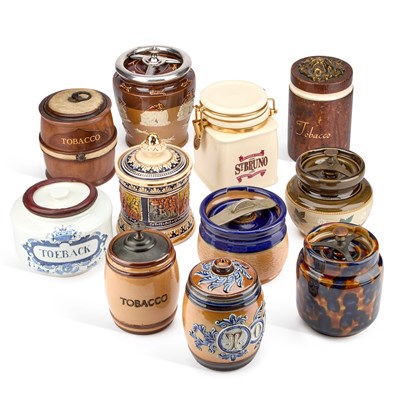 Lot 208 - A COLLECTION OF TOBACCO JARS