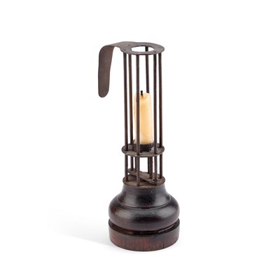 Lot 134 - AN EARLY 19TH CENTURY FRENCH WROUGHT IRON AND WOODEN BIRDCAGE OR STABLE CANDLESTICK