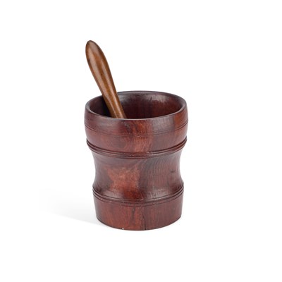 Lot 147 - A EARLY 18TH CENTURY LIGNUM VITAE MORTAR TOGETHER WITH A PESTLE