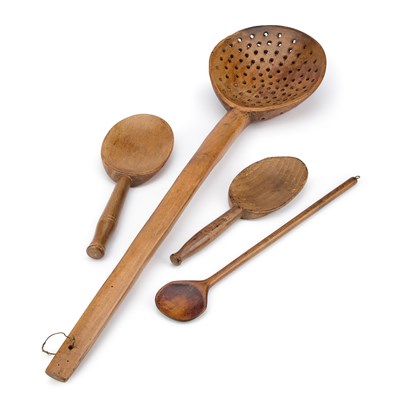 Lot 243 - A LARGE TREEN STRAINER SPOON