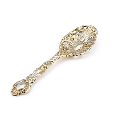 Lot 506 - A VICTORIAN SILVER-GILT SERVING SPOON