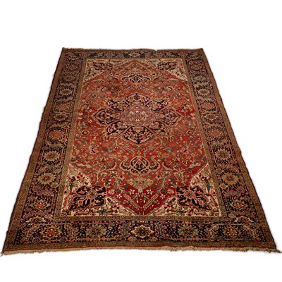 Lot 698 - A PERSIAN HERIZ CARPET