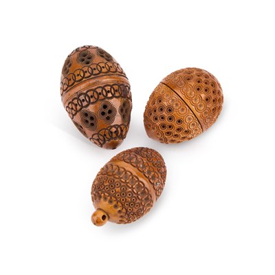 Lot 170 - THREE CARVED COQUILLA NUTS