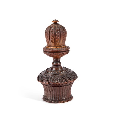 Lot 186 - A 19TH CENTURY CARVED COQUILLA NUT COMBINATION NUTMEG GRATER AND BOX