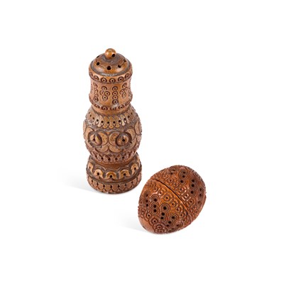 Lot 3 - A 19TH CENTURY CARVED COQUILLA NUT POUNCE POT