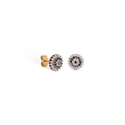 Lot 701 - A PAIR OF BLACK AND WHITE DIAMOND CLUSTER STUD EARRINGS