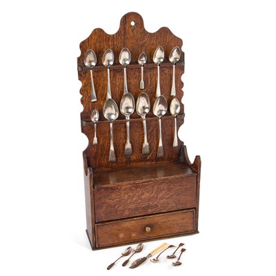 Lot 593 - AN 18TH CENTURY OAK SPOON RACK AND A GROUP OF GEORGIAN AND LATER FLATWARE