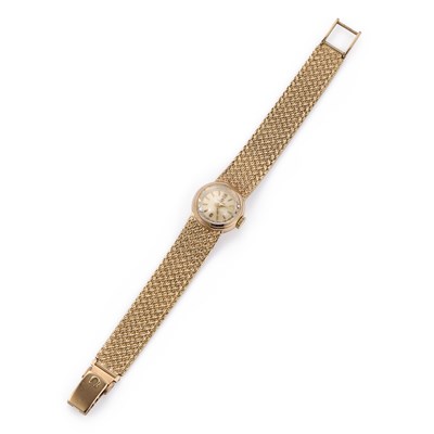 Lot 549 - A LADY'S 9CT GOLD OMEGA BRACELET WATCH