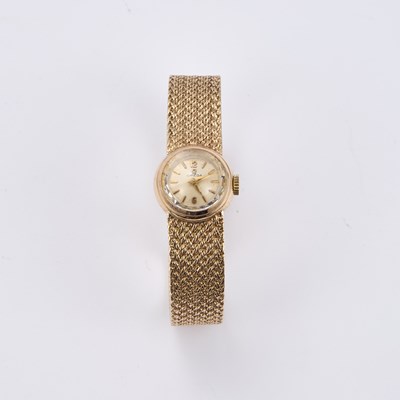 Lot 549 - A LADY'S 9CT GOLD OMEGA BRACELET WATCH