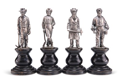 Lot 1038 - A SET OF FOUR HEAVY CAST FIGURES OF SILVER MINERS