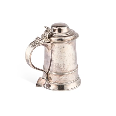 Lot 607 - AN EARLY GEORGE III SILVER TANKARD