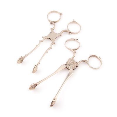 Lot 582 - TWO PAIRS OF GEORGE III SILVER SUGAR TONGS