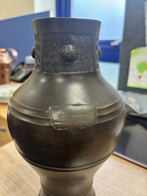 Lot 174 - A CHINESE BRONZE VASE IN THE ARCHAIC TASTE
