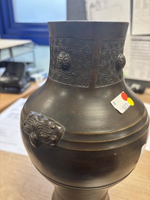 Lot 174 - A CHINESE BRONZE VASE IN THE ARCHAIC TASTE