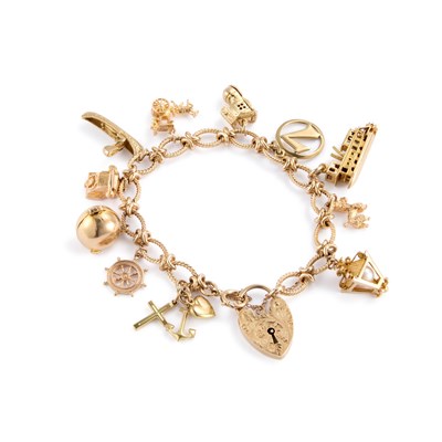 Lot 479 - A 9 CARAT GOLD FANCY LINK CHARM BRACELET