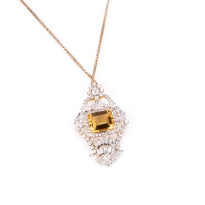 Lot 442 - AN 18 CARAT GOLD CITRINE AND DIAMOND PENDANT ON A 9 CARAT GOLD CHAIN